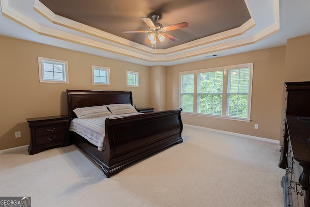 2940 Bentbill Xing, Cumming, GA 30041 - bedroom with a tray ceiling, multiple windows, light carpet, ornamental molding, and ceiling fan