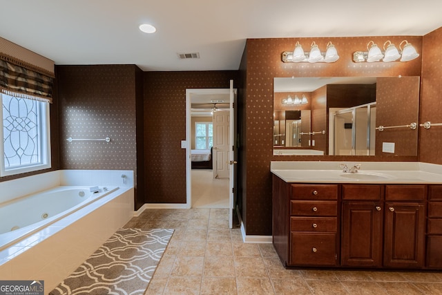 2940 Bentbill Xing, Cumming, GA 30041 - bathroom featuring vanity, a whirlpool tub, tile patterned floors, a stall shower, and wallpapered walls