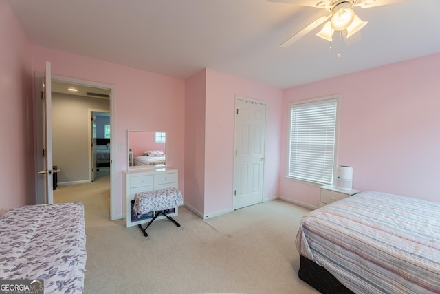 2940 Bentbill Xing, Cumming, GA 30041 - bedroom with light colored carpet and a ceiling fan