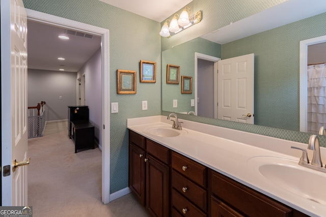 2940 Bentbill Xing, Cumming, GA 30041 - bathroom featuring double vanity and recessed lighting