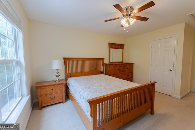 2940 Bentbill Xing, Cumming, GA 30041 - bedroom featuring light carpet and a ceiling fan