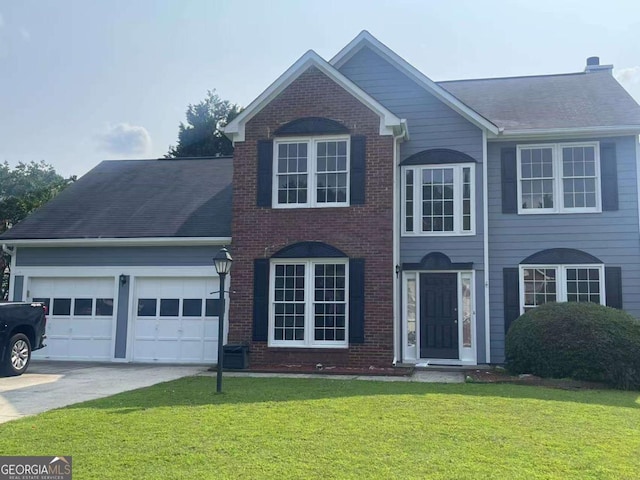 2994 Abbotts Oak Way, Duluth, GA 30097 - view of front of house featuring a garage, concrete driveway, brick siding, and a front lawn