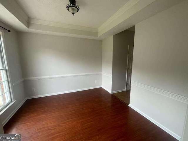 2994 Abbotts Oak Way, Duluth, GA 30097 - unfurnished room with crown molding, wood finished floors, and a tray ceiling
