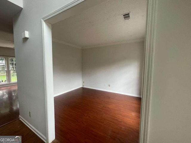 2994 Abbotts Oak Way, Duluth, GA 30097 - unfurnished room with wood finished floors and crown molding