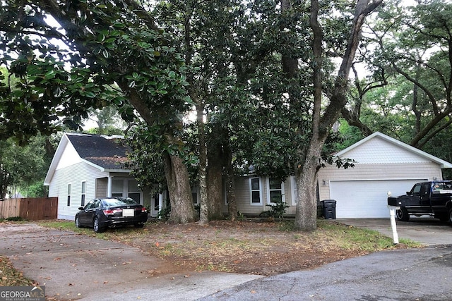 251 Indian Bay Dr, Freeport, FL 32439 - view of front of house featuring concrete driveway and a garage