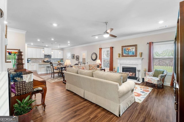 850 Ethereow Ct, Lawrenceville, GA 30046 - living area featuring ornamental molding, plenty of natural light, ceiling fan, recessed lighting, and a fireplace with flush hearth
