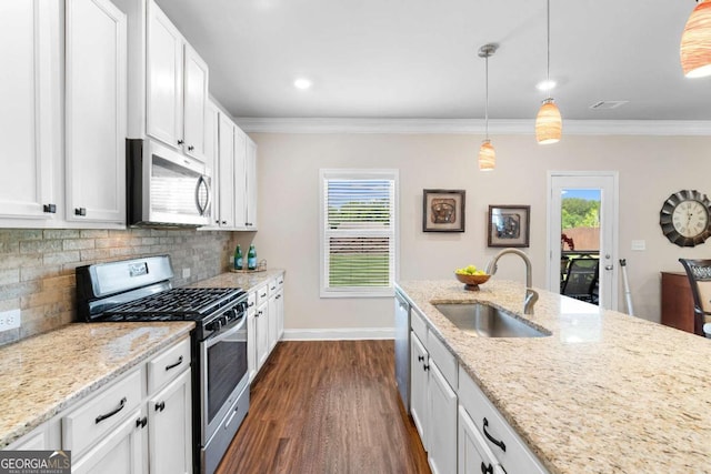 850 Ethereow Ct, Lawrenceville, GA 30046 - kitchen featuring stainless steel appliances, dark wood-style flooring, crown molding, backsplash, and white cabinets
