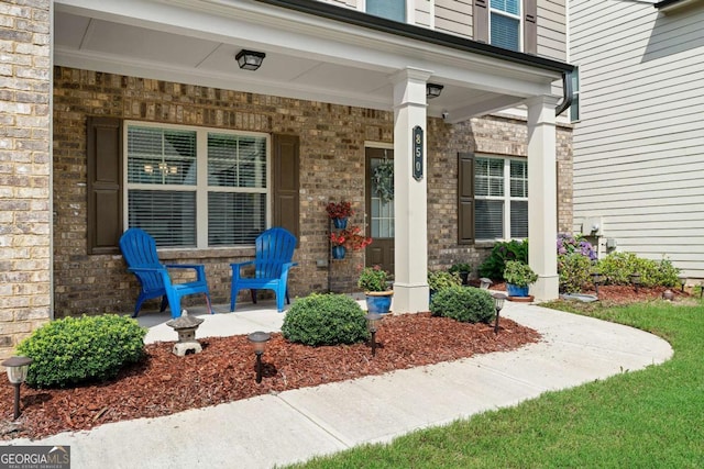 850 Ethereow Ct, Lawrenceville, GA 30046 - property entrance with covered porch and brick siding