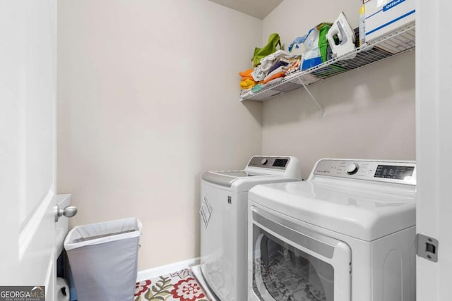 850 Ethereow Ct, Lawrenceville, GA 30046 - laundry area with independent washer and dryer and baseboards