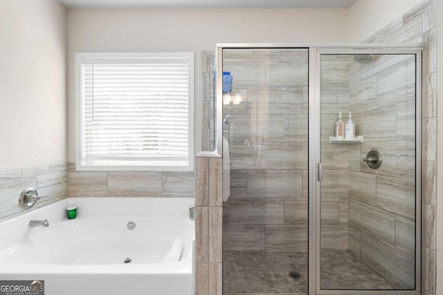 850 Ethereow Ct, Lawrenceville, GA 30046 - full bath featuring a garden tub and a shower stall