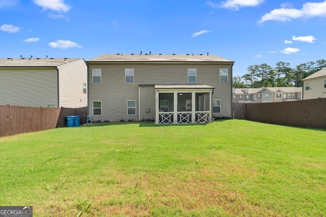 850 Ethereow Ct, Lawrenceville, GA 30046 - back of property featuring a sunroom and a fenced backyard