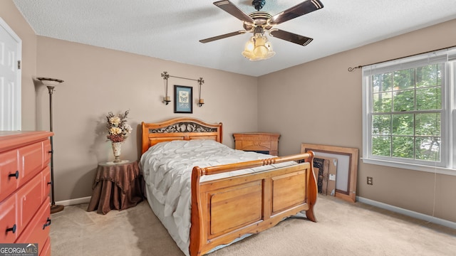 3627 Spring Meadow Ct, Acworth, GA 30101 - bedroom featuring light carpet, ceiling fan, and a textured ceiling