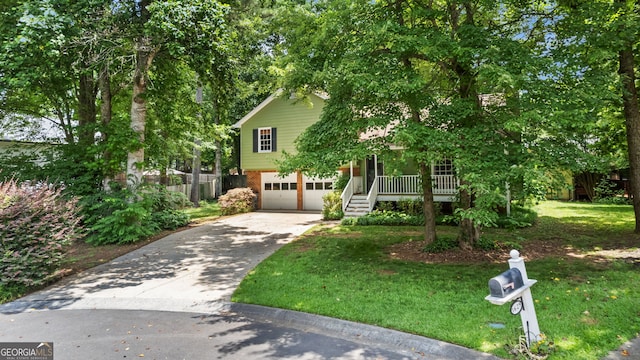 3627 Spring Meadow Ct, Acworth, GA 30101 - view of front facade with concrete driveway, a garage, and brick siding