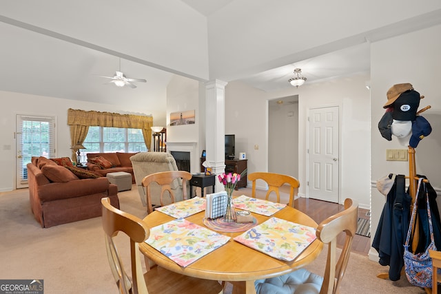 491 Brickleberry Rdg, Athens, GA 30605 - dining area with a fireplace, decorative columns, ceiling fan, high vaulted ceiling, and light colored carpet