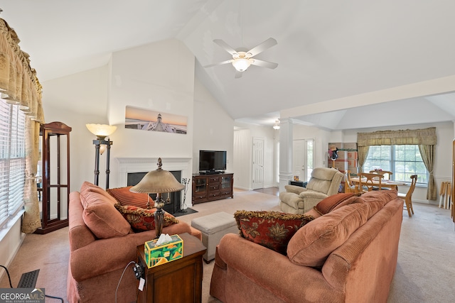 491 Brickleberry Rdg, Athens, GA 30605 - living room featuring light carpet, decorative columns, high vaulted ceiling, ceiling fan, and a fireplace with flush hearth