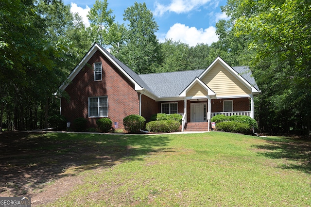 491 Brickleberry Rdg, Athens, GA 30605 - view of front of house with brick siding, covered porch, and a front lawn