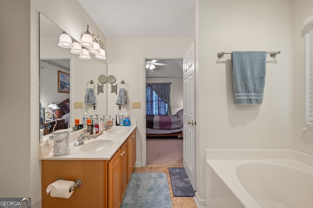 491 Brickleberry Rdg, Athens, GA 30605 - ensuite bathroom with double vanity, a bath, ceiling fan, and tile patterned flooring
