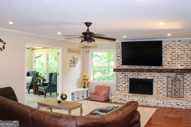1310 Larkview Dr SW, Lilburn, GA 30047 - living room featuring ornamental molding, a ceiling fan, and recessed lighting
