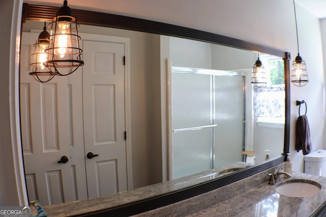 1310 Larkview Dr SW, Lilburn, GA 30047 - bathroom featuring a stall shower and vanity