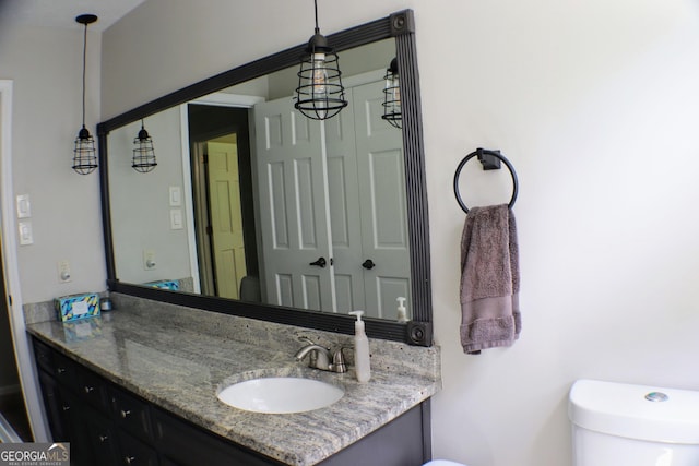 1310 Larkview Dr SW, Lilburn, GA 30047 - bathroom featuring toilet and vanity