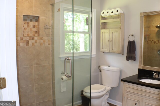 1310 Larkview Dr SW, Lilburn, GA 30047 - bathroom with a shower stall and vanity
