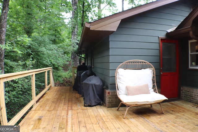 1310 Larkview Dr SW, Lilburn, GA 30047 - wooden terrace featuring grilling area
