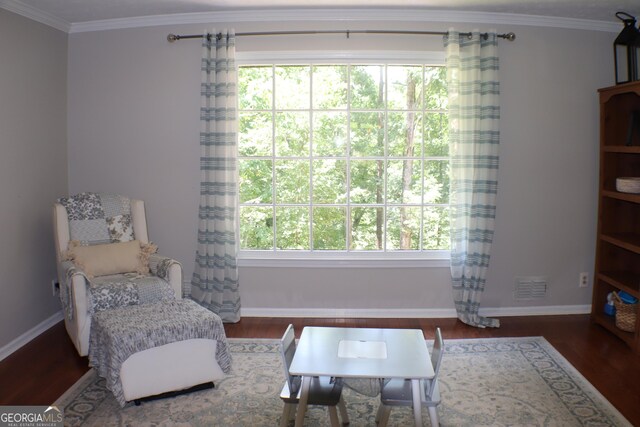 1310 Larkview Dr SW, Lilburn, GA 30047 - living area featuring wood finished floors and crown molding