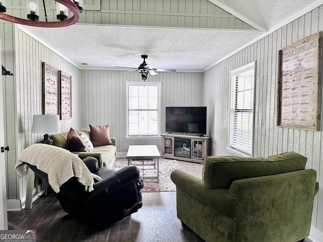 226 Cherokee Rd, Glenwood, GA 30428 - living room with wood finished floors, ornamental molding, a textured ceiling, a ceiling fan, and wooden walls