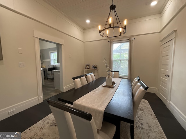 1012 Institute St NW, Conyers, GA 30012 - dining space with a chandelier, crown molding, recessed lighting, and dark wood-type flooring