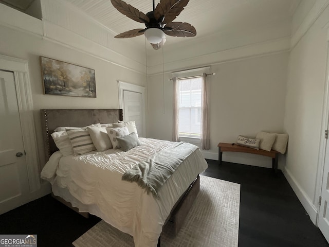 1012 Institute St NW, Conyers, GA 30012 - bedroom featuring dark wood-style flooring and a ceiling fan