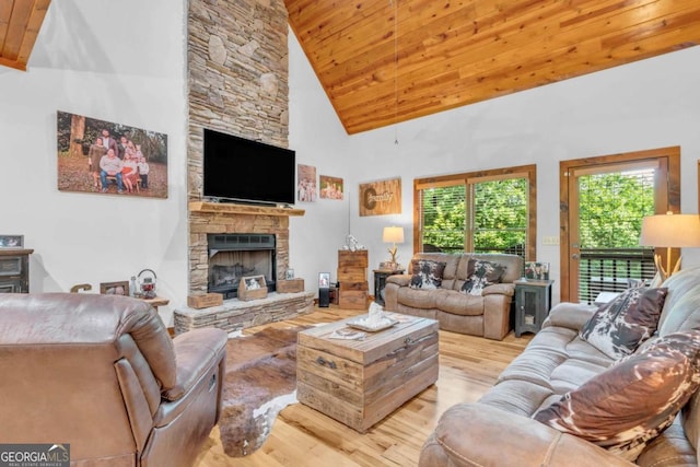 2357 Haven Heights Rd, Hiawassee, GA 30546 - living room with high vaulted ceiling, wood finished floors, a fireplace, and wood ceiling
