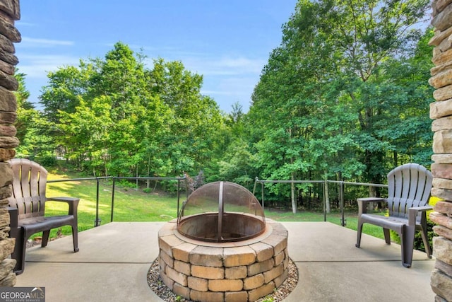 2357 Haven Heights Rd, Hiawassee, GA 30546 - view of patio / terrace with an outdoor fire pit