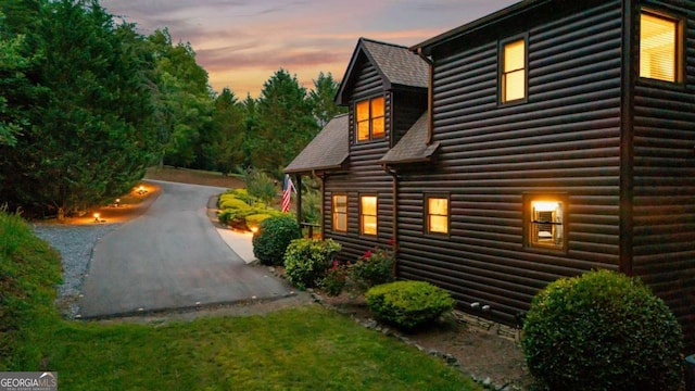 2357 Haven Heights Rd, Hiawassee, GA 30546 - view of side of home featuring faux log siding and roof with shingles