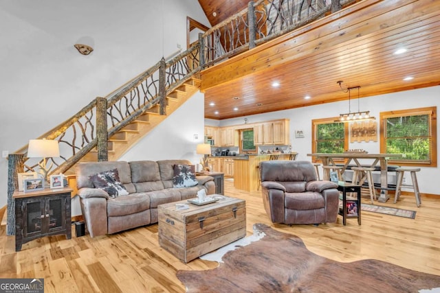 2357 Haven Heights Rd, Hiawassee, GA 30546 - living room featuring light wood-style flooring, recessed lighting, stairway, wood ceiling, and a high ceiling