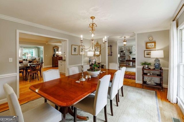 1060 Woodhollow Ln, Athens, GA 30606 - dining area featuring crown molding and light wood finished floors