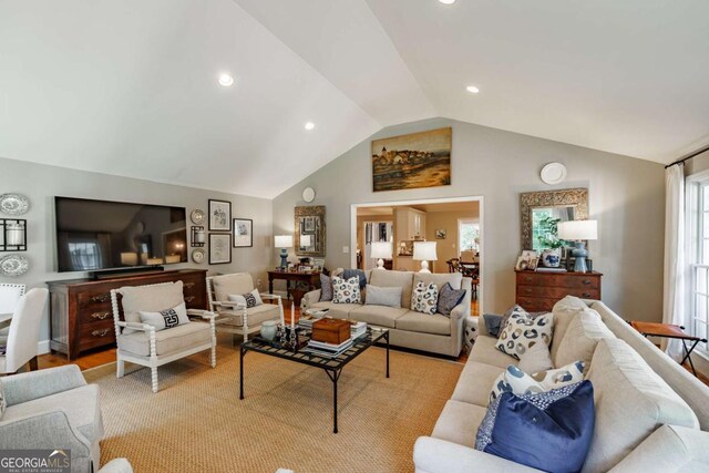 1060 Woodhollow Ln, Athens, GA 30606 - living room featuring vaulted ceiling and recessed lighting