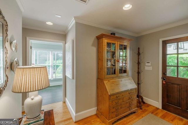 1060 Woodhollow Ln, Athens, GA 30606 - entrance foyer featuring light wood-type flooring, ornamental molding, and recessed lighting