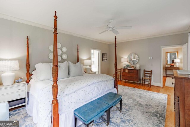 1060 Woodhollow Ln, Athens, GA 30606 - bedroom with ornamental molding, wood finished floors, and a ceiling fan