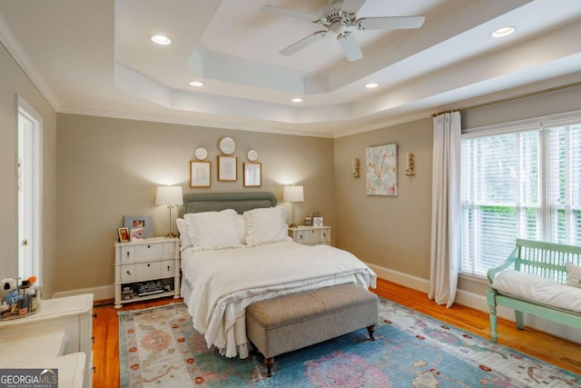 1060 Woodhollow Ln, Athens, GA 30606 - bedroom with light wood finished floors, a raised ceiling, recessed lighting, crown molding, and a ceiling fan