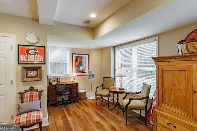 1060 Woodhollow Ln, Athens, GA 30606 - living area with healthy amount of natural light, light wood finished floors, and an office area