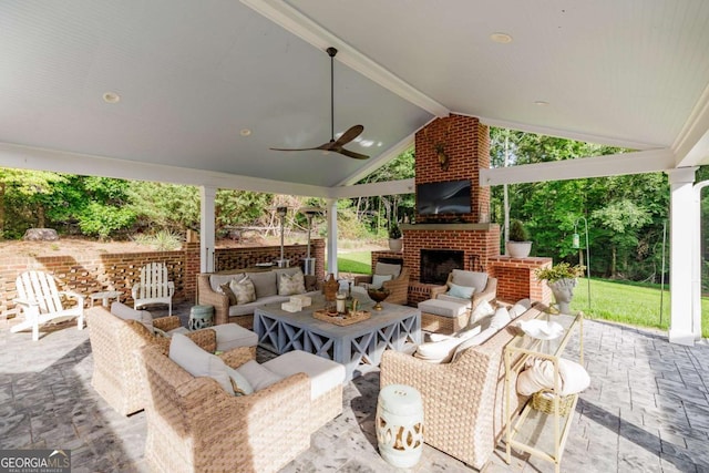 1060 Woodhollow Ln, Athens, GA 30606 - view of patio / terrace with an outdoor living space with a fireplace and ceiling fan