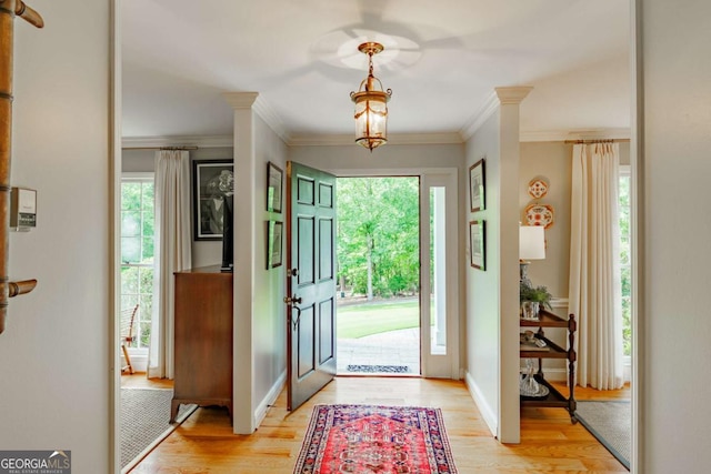 1060 Woodhollow Ln, Athens, GA 30606 - entrance foyer with light wood-style floors and ornamental molding