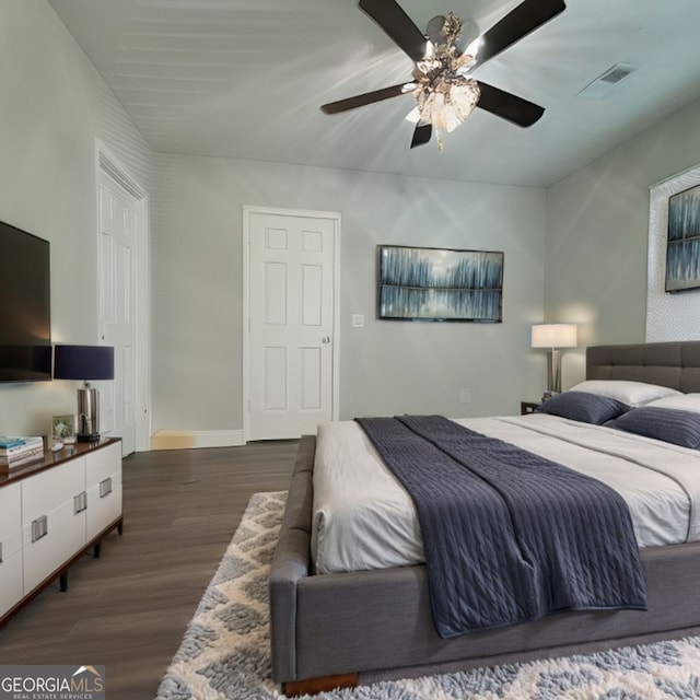303 Latimer St, Marietta, GA 30008 - bedroom with dark wood-style floors and ceiling fan