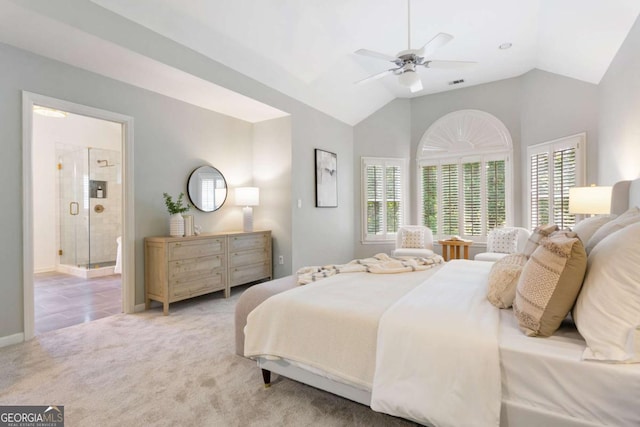 5007 Highland Oaks Ct SE, Smyrna, GA 30126 - bedroom featuring multiple windows, light colored carpet, lofted ceiling, ensuite bathroom, and ceiling fan