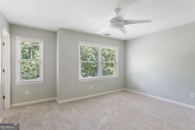 5007 Highland Oaks Ct SE, Smyrna, GA 30126 - carpeted spare room featuring healthy amount of natural light and ceiling fan