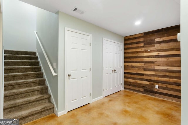 5007 Highland Oaks Ct SE, Smyrna, GA 30126 - stairway featuring wood walls and recessed lighting