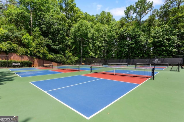 5007 Highland Oaks Ct SE, Smyrna, GA 30126 - view of tennis court with community basketball court