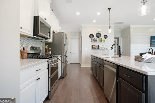 550 Azalea Xing, Dallas, GA 30132 - kitchen with stainless steel appliances, white cabinetry, light countertops, recessed lighting, and backsplash