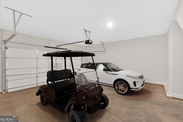 550 Azalea Xing, Dallas, GA 30132 - garage with baseboards and a garage door opener