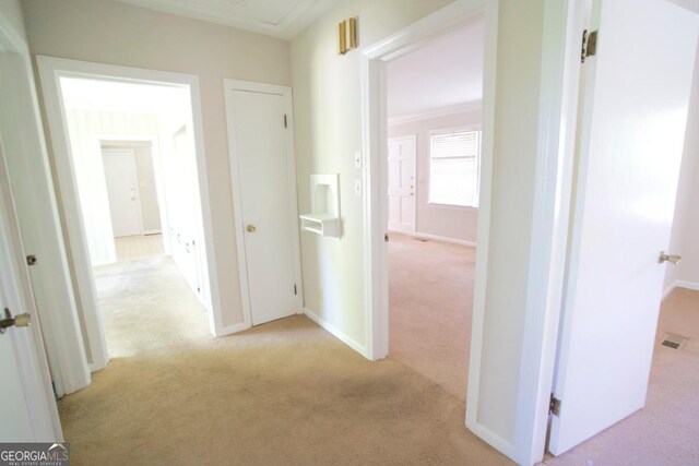 5530 Perry Ave, Columbus, GA 31909 - hallway featuring light carpet and baseboards